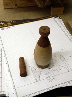 Rocket blank rough shaped with the porthole glued in.