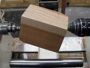 Cherry blank Mounted on the lathe.